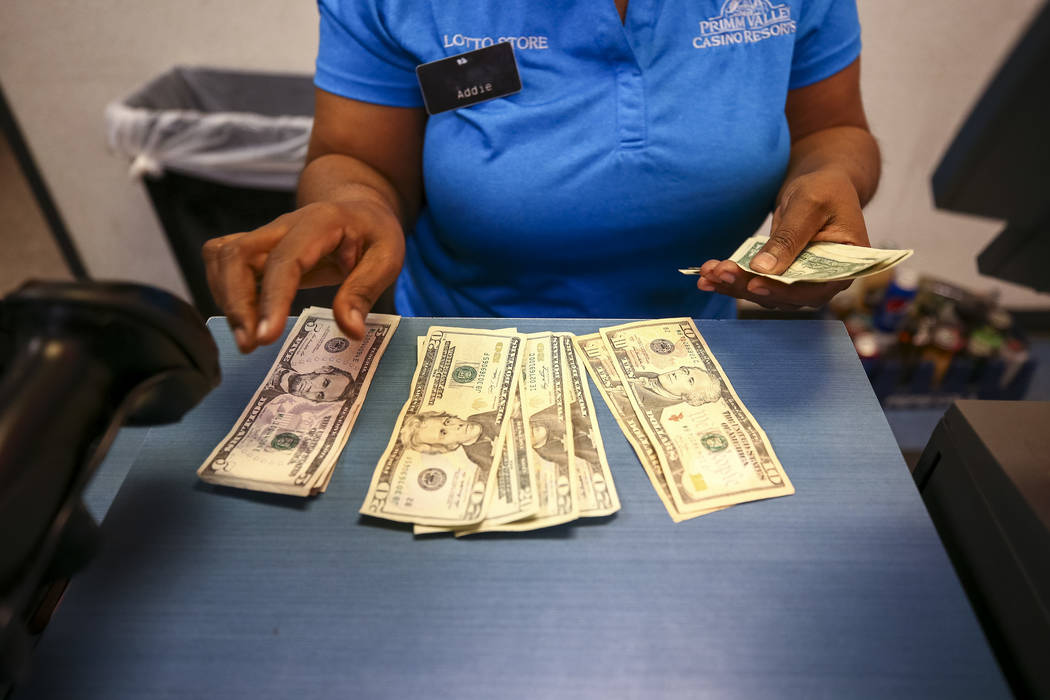 A cashier works the counter at The Lotto Store at Primm just inside the California border next to the Primm Valley Casino Resorts on Friday, January 5, 2017. Richard Brian Las Vegas Review-Journal ...