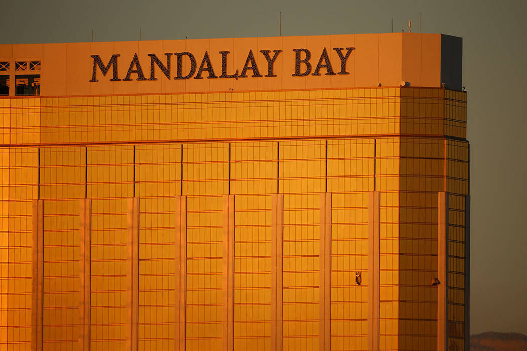 Two windows are blown out from Mandalay Bay the morning after a mass shooting in Las Vegas, Monday, Oct. 2, 2017. Joel Angel Juarez Las Vegas Review-Journal @jajuarezphoto