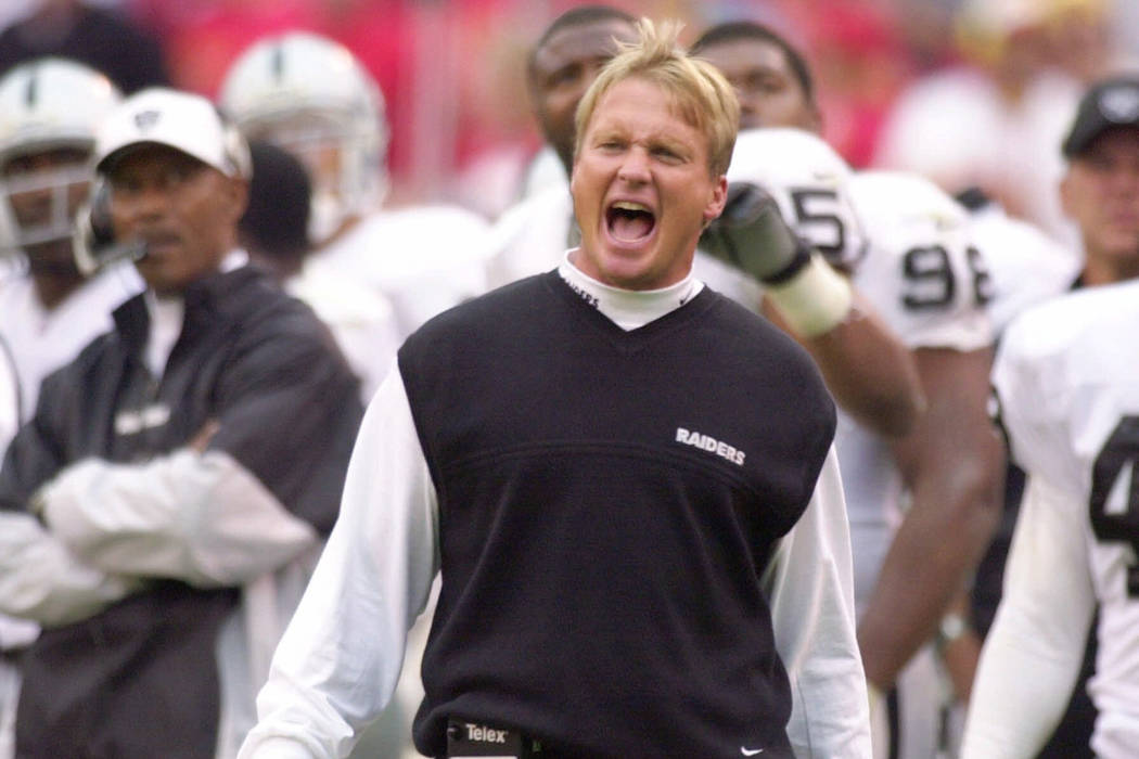 Oakland Raiders coach Jon Gruden yells to his team while officials review a play in the second half against the Kansas City Chiefs in Kansas City, Mo., Sunday, Oct, 15, 2000. The Raiders beat the ...