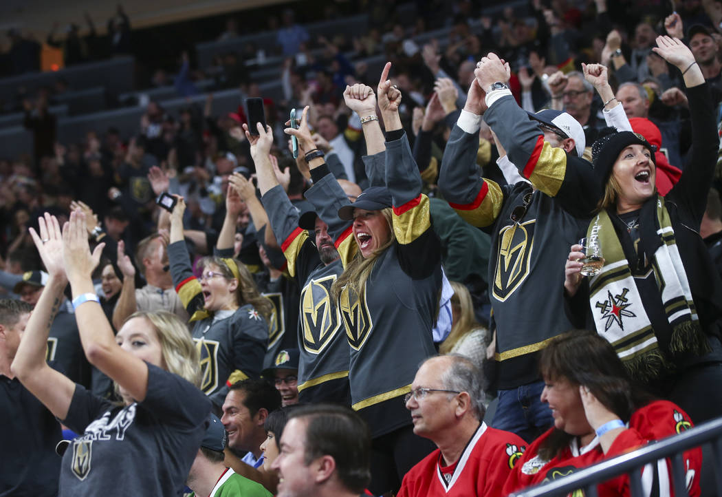 Golden Knights fans celebrate the first goal against the Chicago Blackhawks during an NHL hockey game at T-Mobile Arena in Las Vegas on Tuesday, Oct. 24, 2017. (Chase Stevens/Las Vegas Review-Jour ...