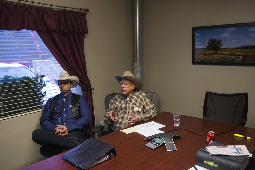 Ryan Bundy, left, and his father, Bunkerville rancher Cliven Bundy, at the office of defense attorney Bret Whipple in downtown Las Vegas on Tuesday, Jan. 9, 2018. Chase Stevens Las Vegas Review-Jo ...