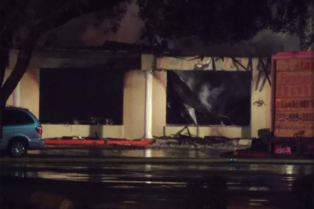 Clark County firefighters battled a blaze at a strip mall on the 3400 block of Jones Boulevard, near Desert Inn Road, early Tuesday morning. (Max Michor/Las Vegas Review-Journal)