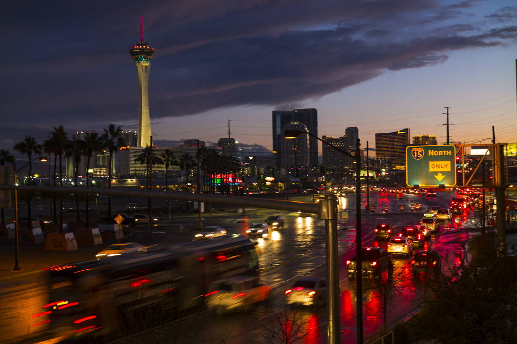 Traffic along Grand Central Parkway near Charleston Boulevard as the sun sets after a long day of rain in Las Vegas on Tuesday, Jan. 9, 2018. Chase Stevens Las Vegas Review-Journal @csstevensphoto