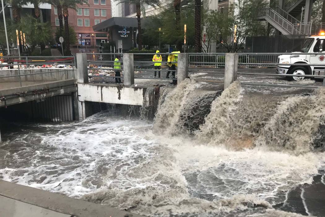 Floodwaters flow out of garage of the Linq on the Las Vegas Strip and run into the wash behind the hotel-casino, Tuesday, Jan. 9, 2018. (Elaine Wilson/Las Vegas Review-Journal)