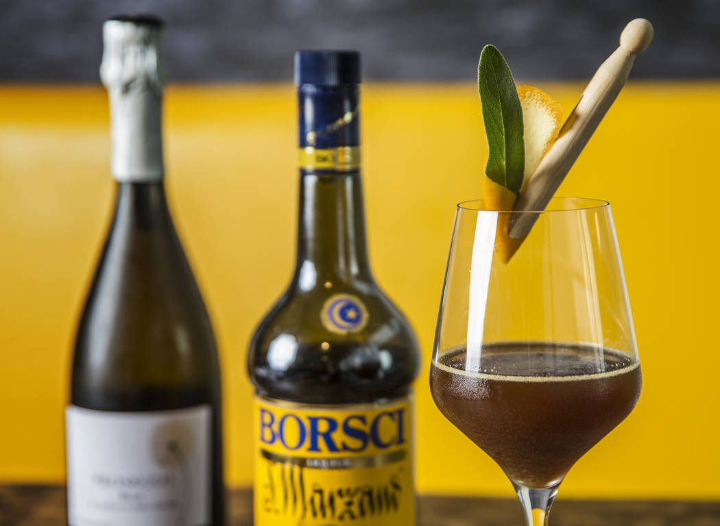 The Bubbly Pino with amaro, prosecco and orange smash at Esther's Kitchen on Tuesday, January 9, 2018, in Las Vegas. Benjamin Hager Las Vegas Review-Journal @benjaminhphoto