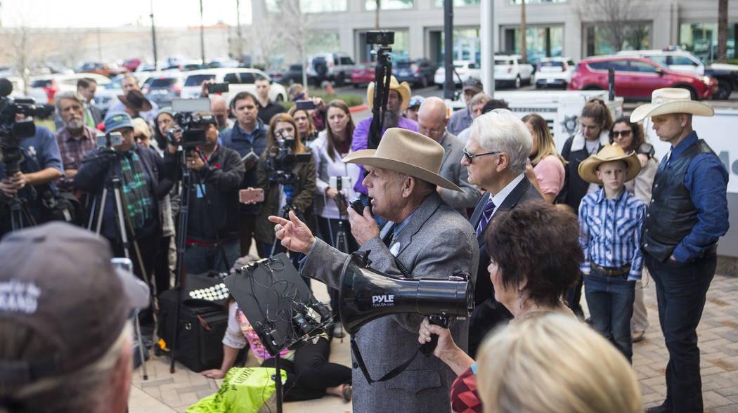 Rancher Cliven Bundy, center, address supporters and journalists at Metropolitan Police Department headquarters on Wednesday, Jan. 10, 2018. Chase Stevens Las Vegas Review-Journal @csstevensphoto