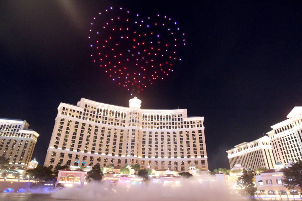 Lighted drones fly over the Bellagio as part of the Intel Shooting Star show as part of the Consumer Electronics Show at the Las Vegas Convention Center Wednesday, Jan. 10, 2018. K.M. Cannon Las V ...