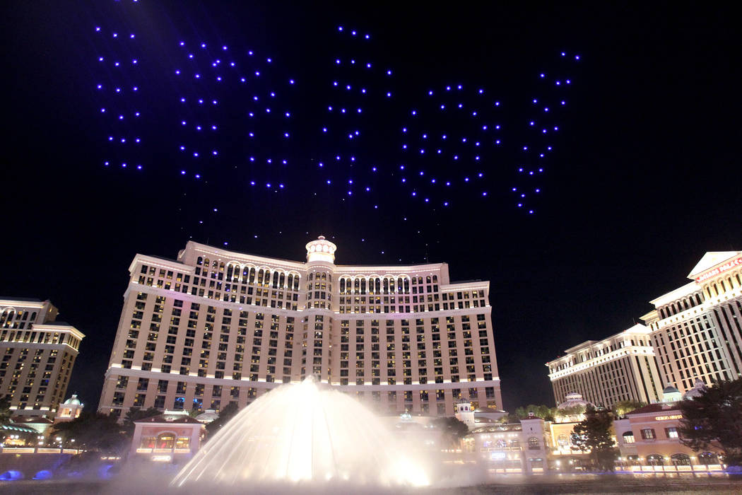 Lighted drones fly over the Bellagio as part of the Intel Shooting Star show as part of the Consumer Electronics Show at the Las Vegas Convention Center Wednesday, Jan. 10, 2018. K.M. Cannon Las V ...