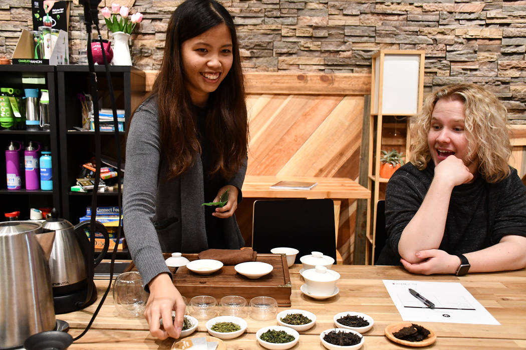Rie Tuliali, a general manager at Tealet, a grower network specializing in direct trade tea, teaches a class about Chinese tea at Tea and Whisk. Leodianto Lukidi, store owner, said he wants to gro ...