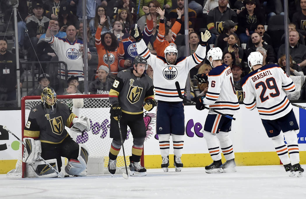Edmonton Oilers left wing Patrick Maroon (19) celebrates after scoring a goal against Vegas Golden Knights goalie Marc-Andre Fleury, left, during the second period of an NHL hockey game Saturday, ...