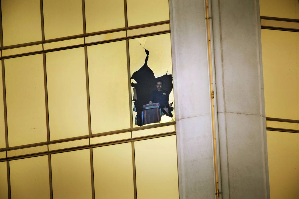 The FBI investigates the scene on the 32nd-floor of the Mandalay Bay on Wednesday, Oct. 4, 2017, in Las Vegas. (Richard Brian Las Vegas Review-Journal)