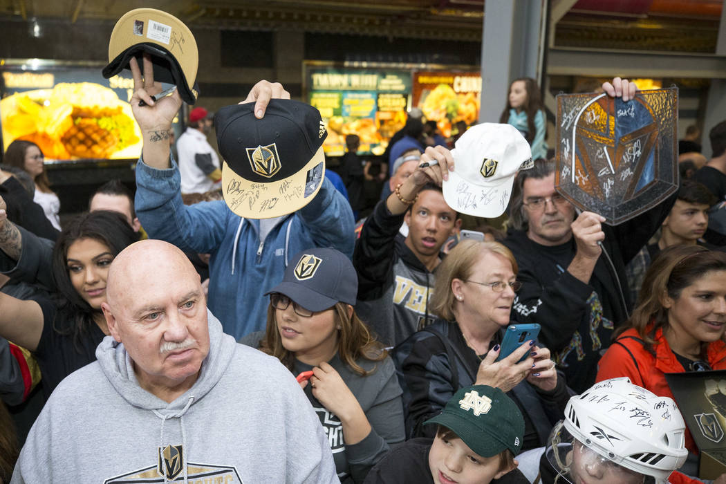 Vegas Golden Knights wait for autographs during the team's first fan fest at the Fremont Street Experience in downtown Las Vegas on Sunday, Jan. 14, 2018. Richard Brian Las Vegas Review-Journal @v ...