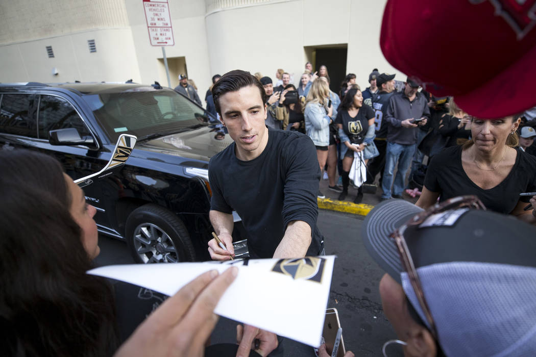 Vegas Golden Knights goaltender Marc-Andre Fleury (29) signs autographs during the team's first fan fest at the Fremont Street Experience in downtown Las Vegas on Sunday, Jan. 14, 2018. Richard Br ...