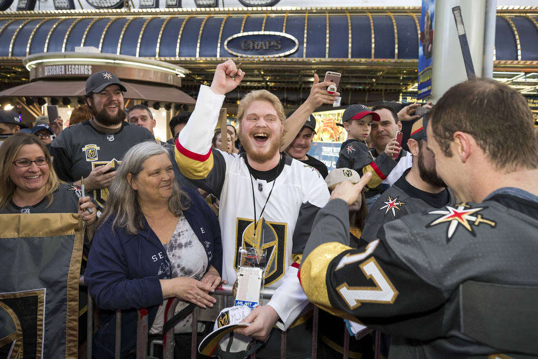Vegas Golden Knights fans cheers for Knights defenseman Brad Hunt (77) during the team's first fan fest at the Fremont Street Experience in downtown Las Vegas on Sunday, Jan. 14, 2018. Richard Bri ...
