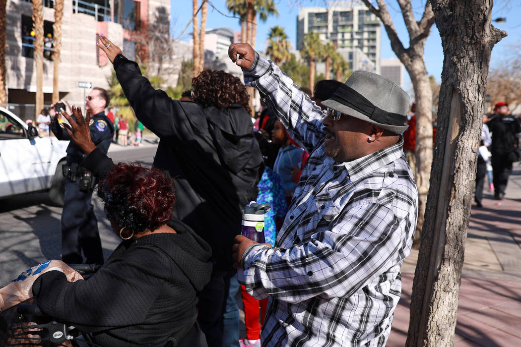 Curtis Williams dances while attending the 36th annual Dr. Martin Luther King Jr. Parade, themed "Living the Dream: Building a Bridge to Unity," in downtown Las Vegas, Jan. 15, 2018. The parade fe ...