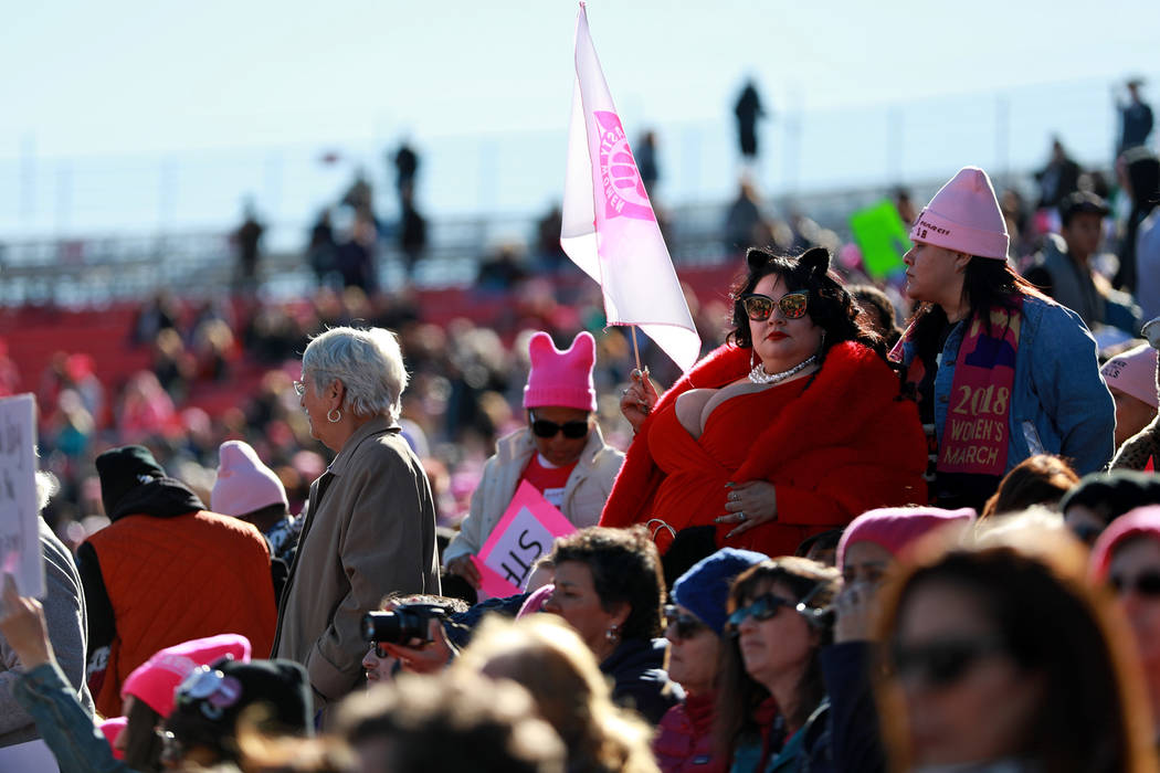 Attendees cheer during the Power to the Polls event, hosted by the Women's March, at the Sam Boyd Stadium in Las Vegas, Jan. 21, 2018. The event, which served as an advocacy tool to register new v ...