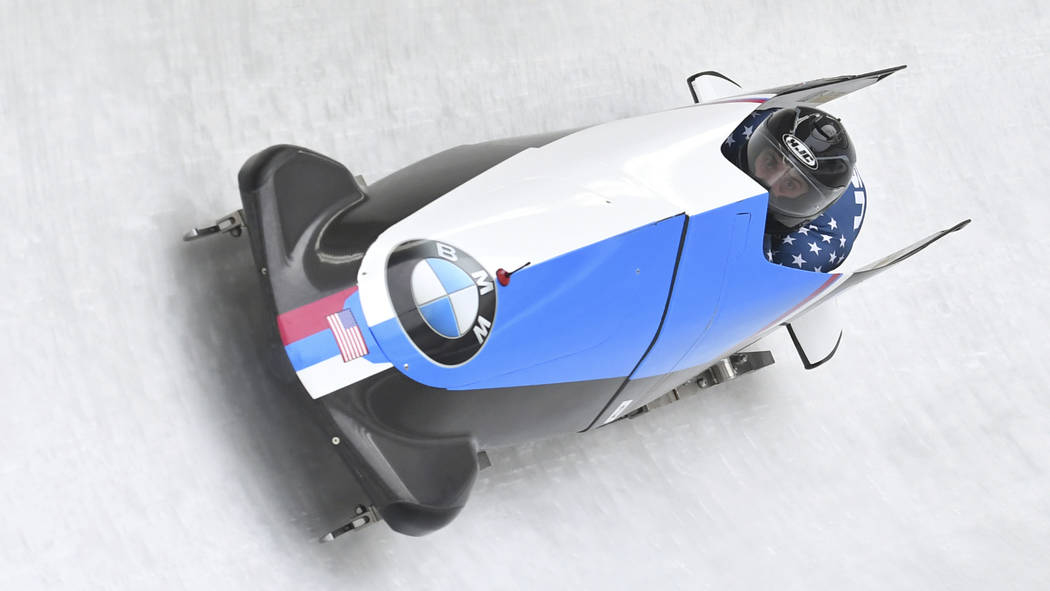 Justin Olsen and Evan Weinstock of the United States speed down the track during the first run of the men's two-man bobsled World Cup race in Igls, near Innsbruck, Austria, Saturday, Feb. 4, 2017. ...