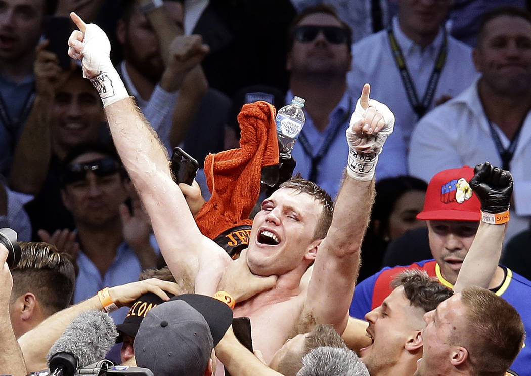 FILE - In this July 2, 2017, file photo, Jeff Horn, of Australia, celebrates after beating Manny Pacquiao, of the Philippines, during their WBO World Welterweight title fight in Brisbane, Australi ...