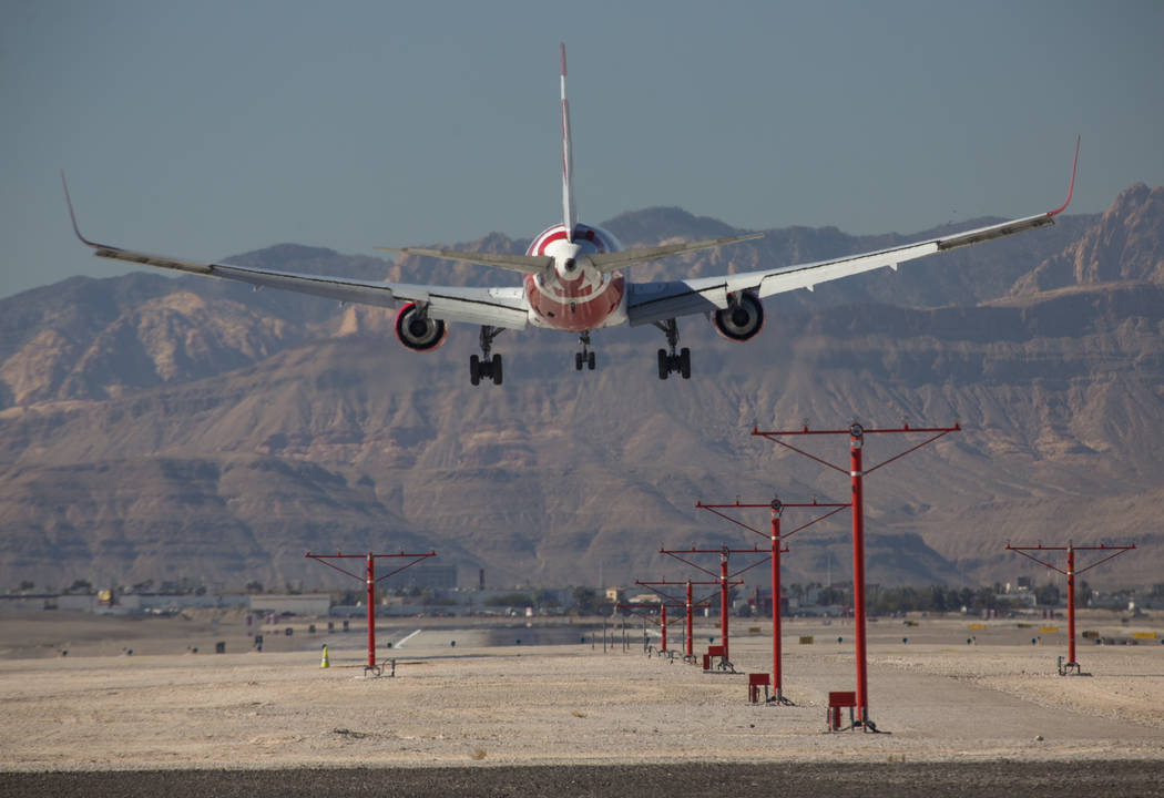 An Air Canada Rouge flight descends as it approaches McCarran International Airport in Las Vegas on Monday, Jan. 22, 2018. Richard Brian Las Vegas Review-Journal @vegasphotograph