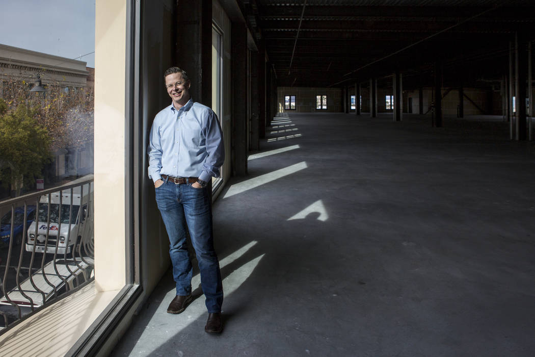 Eric Entringer, vice president of capital markets and investor relations for Dornin Investment Group, DIG, in office space in Town Square recently purchased by DIG for $11.8 million on Thursd ...