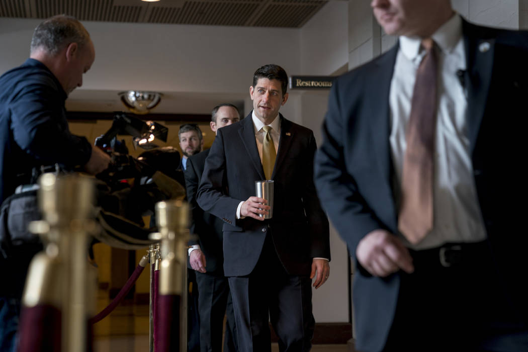 House Speaker Paul Ryan of Wis., center, walks to the Capitol Building from the Capitol Visitor's Center, Thursday, Jan. 18, 2018, in Washington. (Andrew Harnik/AP)