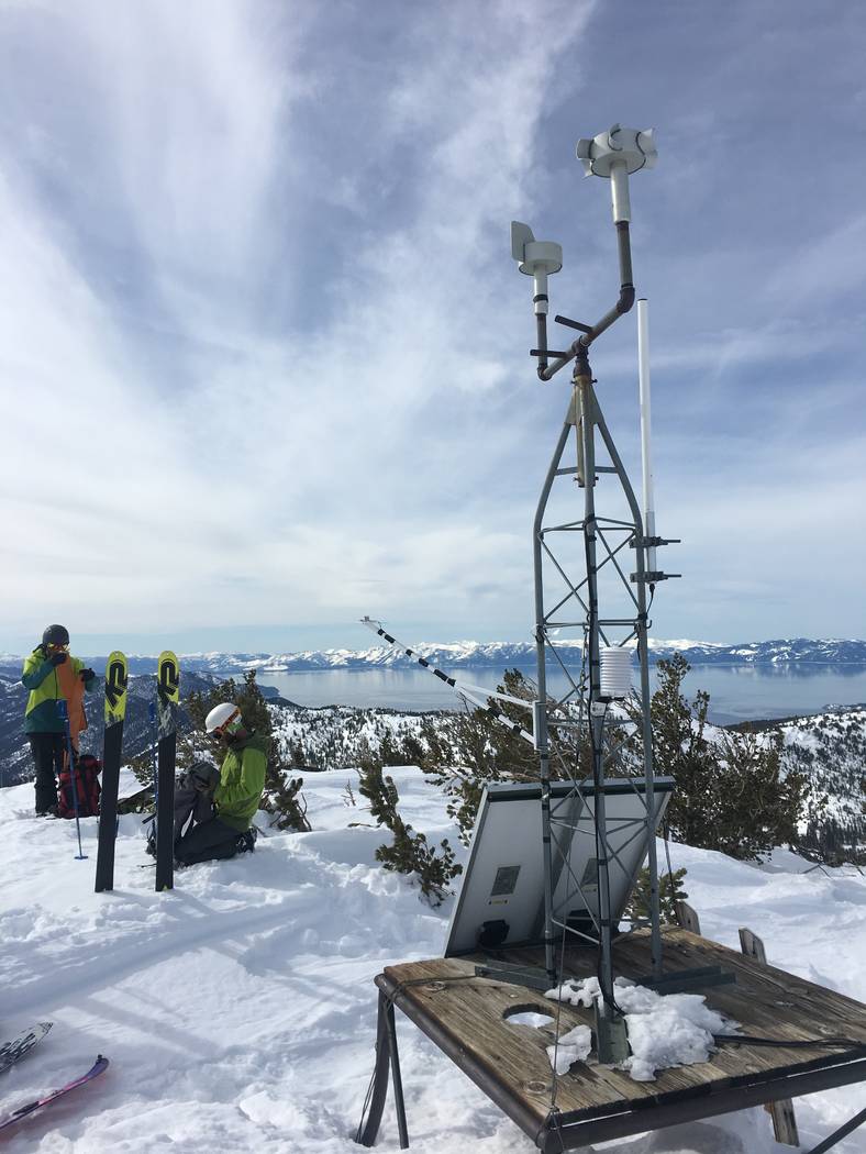 An undated photo shows scientists from the Desert Research Institute at the Slide Mountain weather station, which overlooks Lake Tahoe near Reno. Siani Nau