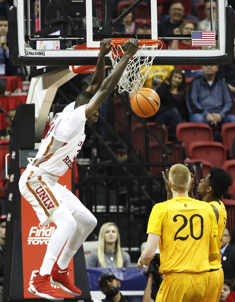 UNLV Rebels' Cheikh Mbacke Diong (34) dunks the ball during the basketball game against Wyoming at the Thomas and Mack Center in Las Vegas on Saturday, Feb. 10, 2018. Andrea Cornejo Las Vegas Revi ...