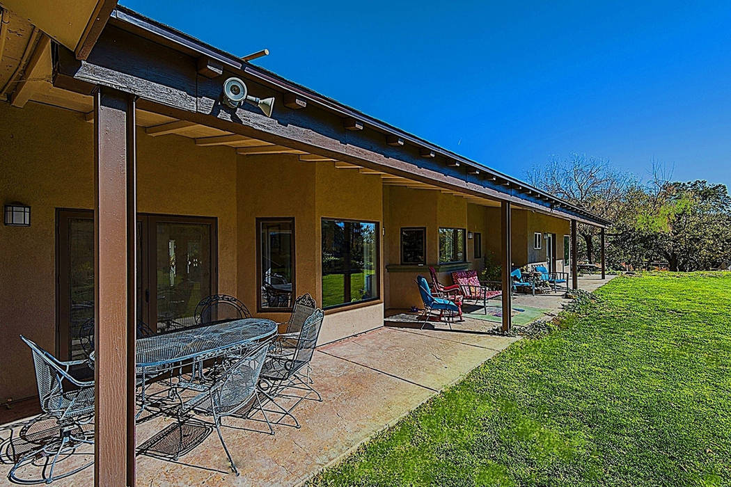 The property at 9590 Mule Deer Road includes a 4,014-square-foot house. (Realty One Group)