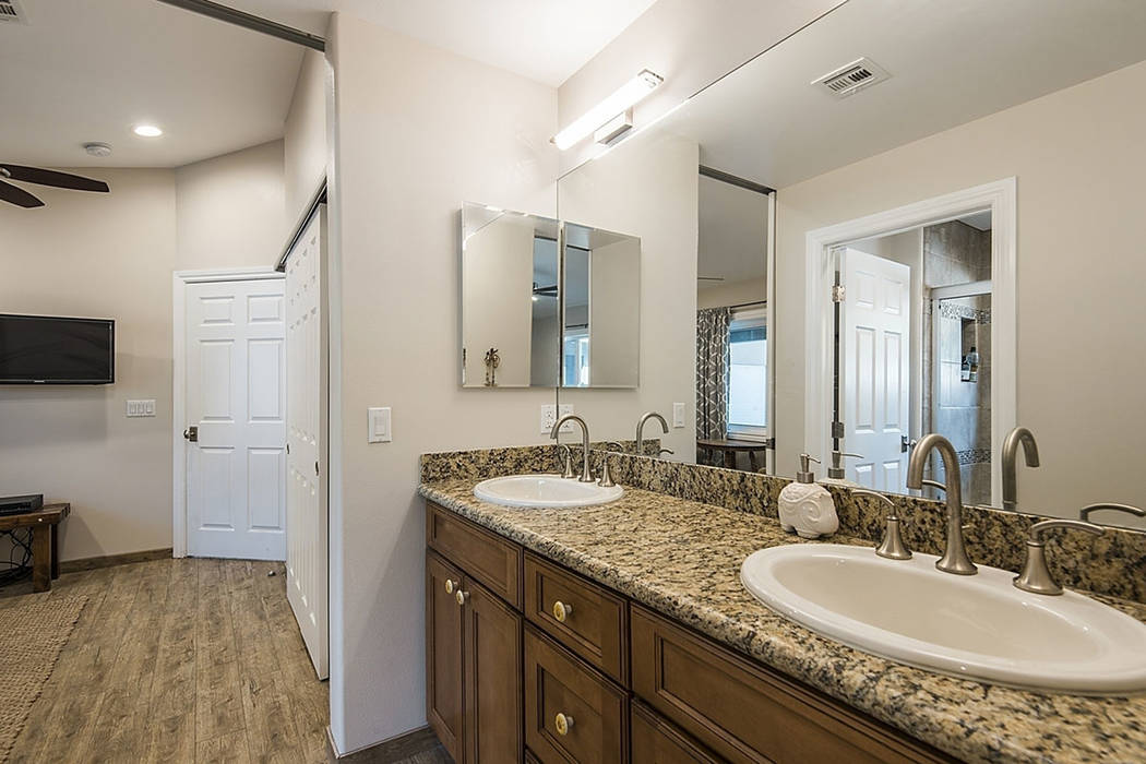 One of the baths at the property at 9590 Mule Deer Road. (Realty One Group)