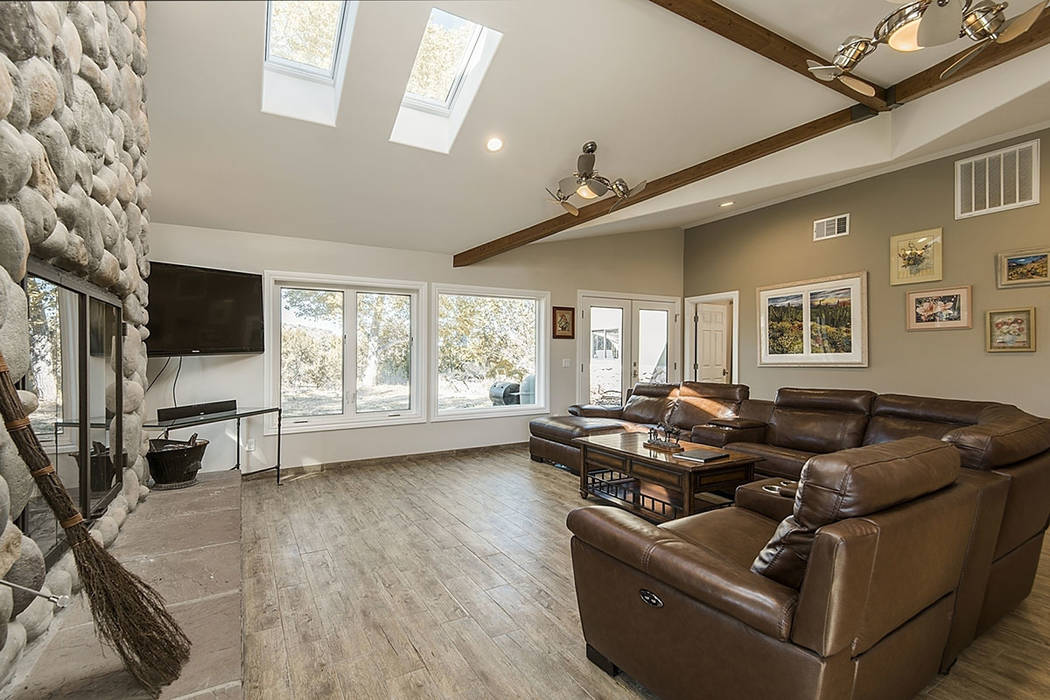 The family room features large windows. (Realty One Group)