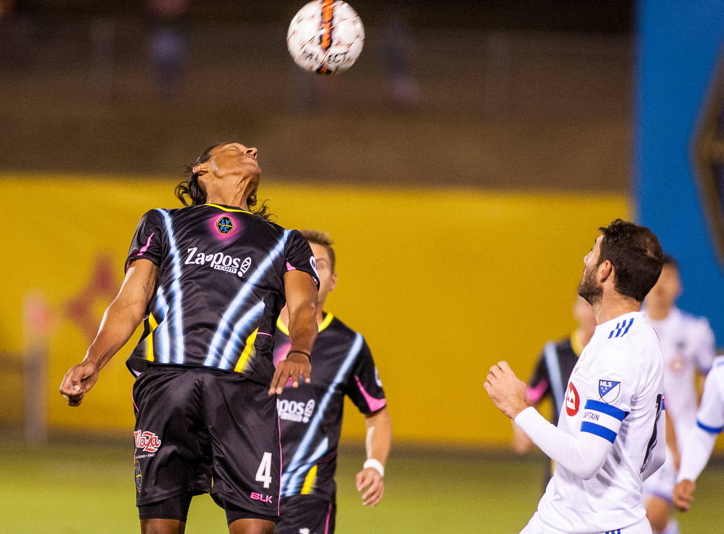 Las Vegas Lights' Joel Huiqui head butts the ball while playing against Montreal Impact during the first Las Vegas Lights FC game at Cashman Field in Las Vegas on Saturday, Feb. 10, 2018.  Patrick ...