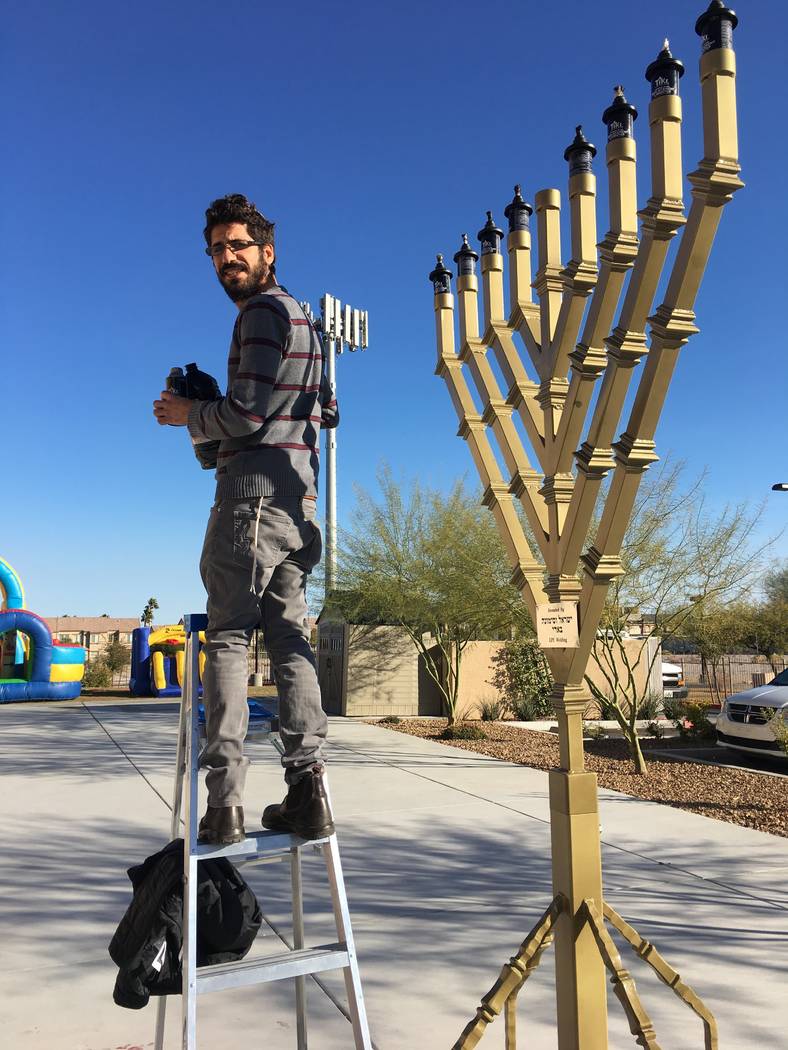 Shimon Abta prepares for Hanukkah. Courtesy of Esther Abta.