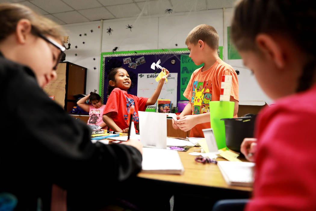 Devon Jernigan, 9, and Jake Stadler, 8, work on a class assignment at Doris French Elementary School, which went from being ranked two stars to five stars, in Las Vegas, Friday, Feb. 2, 2018. Andr ...