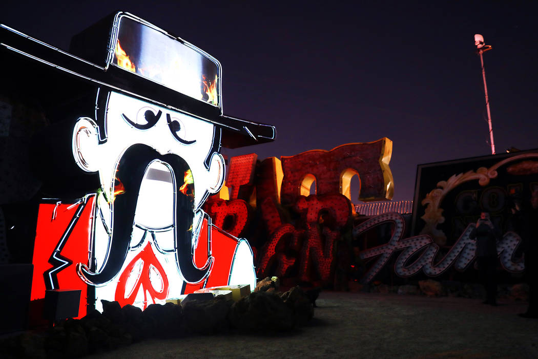 Signs are illuminated in "Brilliant!"Рan audiovisual immersion experience that uses technology advances to reanimate 40 monumental examples of the museum's iconic vintage s ...
