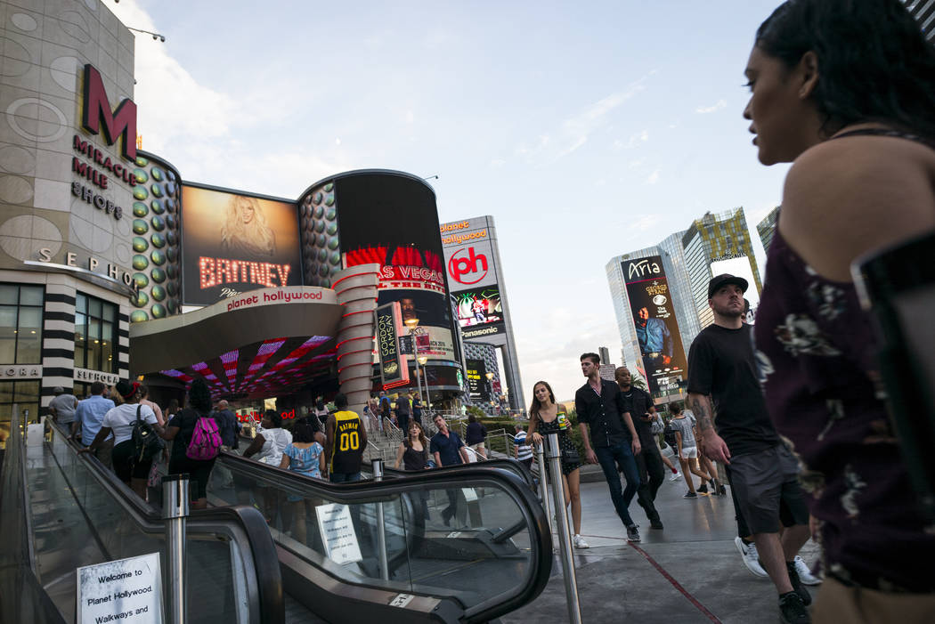 Tourists walk along the Las Vegas Strip in this file photo. Chase Stevens Las Vegas Review-Journal @csstevensphoto