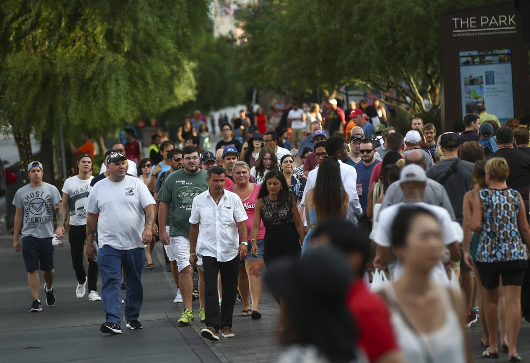 Tourists walk along the Las Vegas Strip in this file photo. Chase Stevens Las Vegas Review-Journal @csstevensphoto