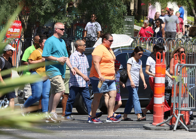 Tourists walk along the Las Vegas Strip in this file photo. (Bizuayehu Tesfaye/Las Vegas Review-Journal Follow @bizutesfaye)