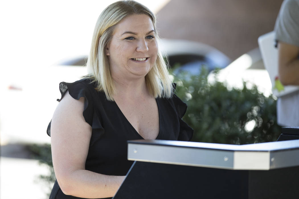 Heather Ebneter, operations manager at Nevada Legal Support Services, announces the postponed date of the Lucky Dragon hotel-casino auction, at the Nevada Legal Support Services office in Las Vega ...