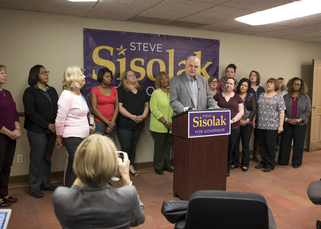 Clark County Commission Chairman and Democratic gubernatorial candidate Steve Sisolak speaks to CCSD employees during a news conference at the Clark County Education Association building in Las Ve ...