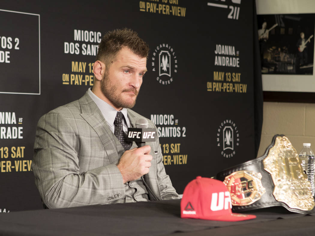 UFC heavyweight champion Stipe Miocic addresses his win over Junior dos Santos at the UFC 211 post-fight press conference at the American Airlines Center in Dallas, Texas, on Saturday, May 13, 201 ...