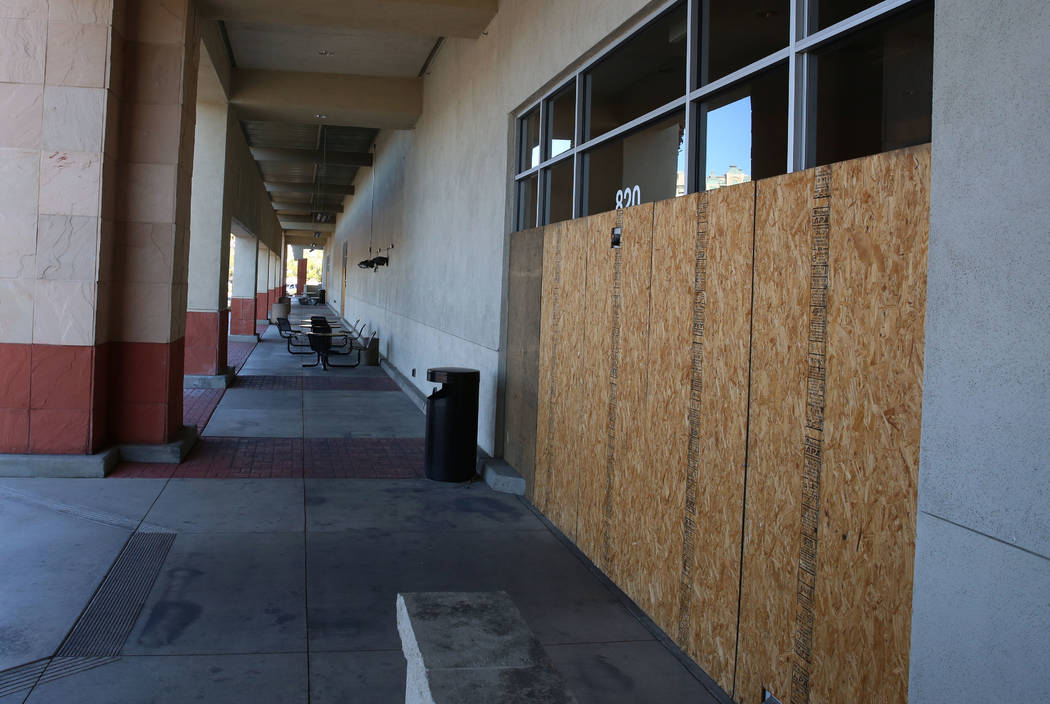 The boarded up entrance of former grocer Haggen in Boca Park on Wednesday, Feb. 7, 2018, in Las Vegas. The store remains empty more than two years after the grocery chain went bankrupt. Bizuayehu  ...