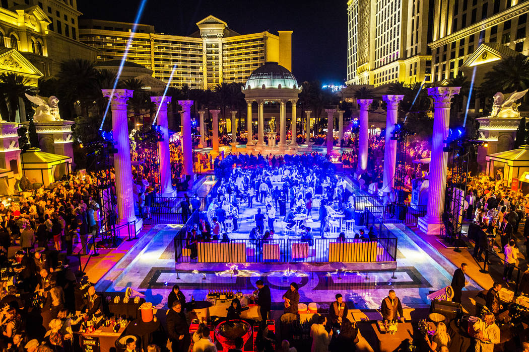 More than 2,500 guests pack the Garden of the Gods Pool Oasis during The  Grand Tasting at Vegas Uncork'd on Friday, April 28, 2017, at Caesars  Palace hotel-casino, in Las Vegas. (Benjamin