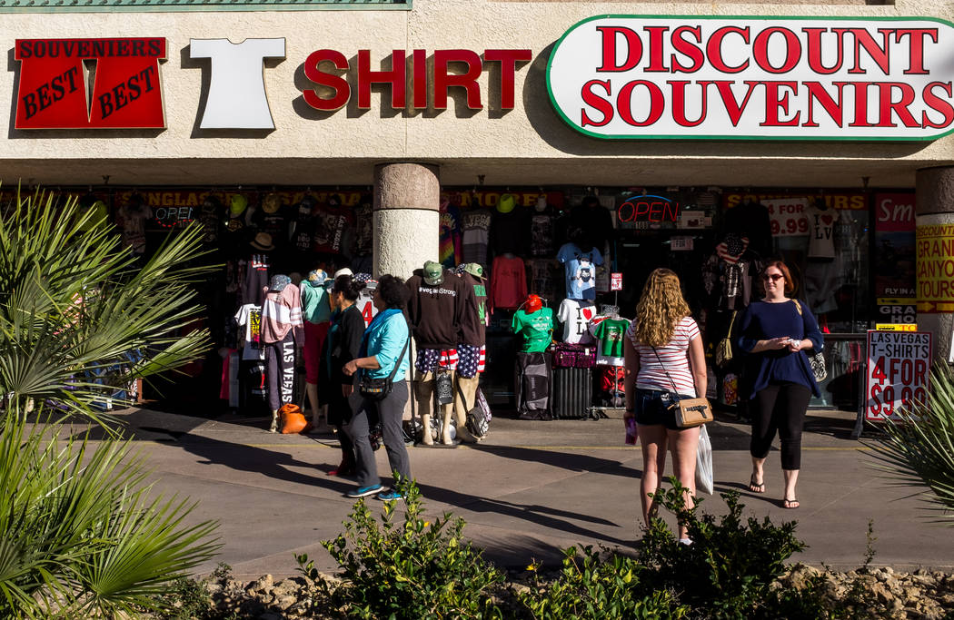 Strip visitors walk past a Discount Souvenirs shop on Las Vegas Boulevard on Wednesday, Feb. 7, 2018.  Patrick Connolly Las Vegas Review-Journal @PConnPie