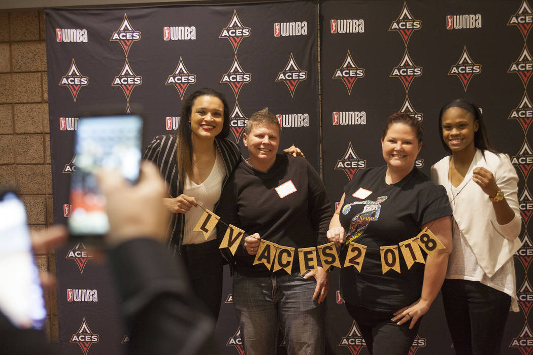 Las Vegas Aces guard Kayla McBride, from left, fan Nichole Coleman, fan Jaymine Netterfield and Aces point guard Moriah Jefferson pose for a photo at the Mandalay Bay Event Center in Las Vegas, Tu ...