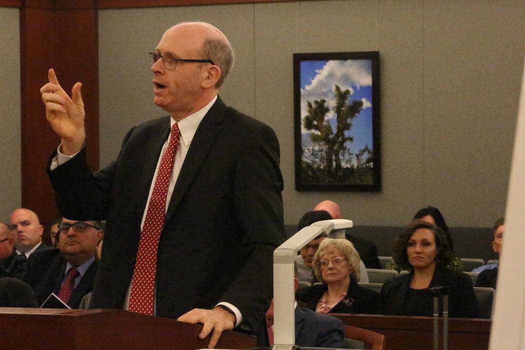 Marc Elias, attorney for recall opponents Joyce Woodhouse and Nicole Cannizzaro, lower right, argues whether it is constitutional to allow people to have their names removed from the recall petiti ...
