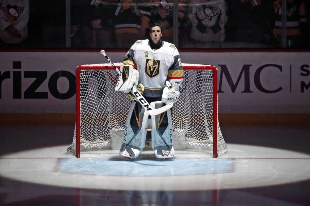 Vegas Golden Knights goaltender Marc-Andre Fleury stands during the national anthem before the team's NHL hockey game against his former team, the Pittsburgh Penguins, in Pittsburgh on Tuesday, Fe ...