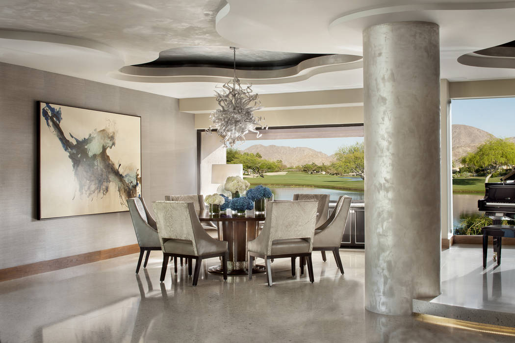 Willetts Design & Associates
Ceilings and soffits in custom-painted silver, gold and champagne tones add luminous shine, complemented by the large-scale Cambria floor tiles, all of which work ...