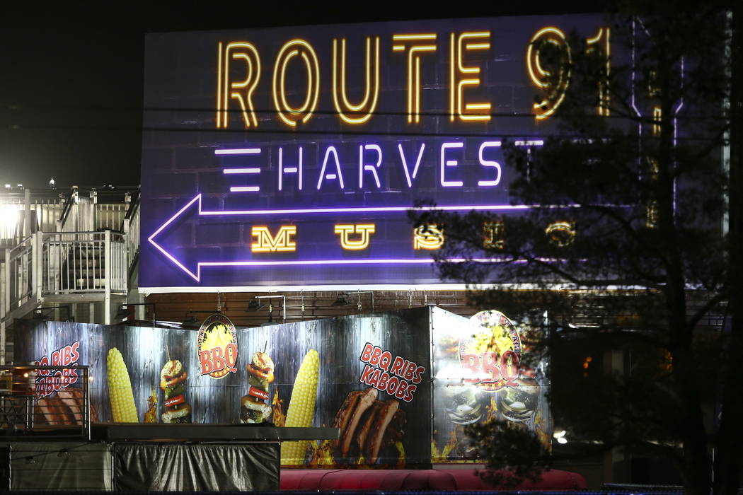 Festival grounds for Route 91 rise in the background as Las Vegas police investigate following an active shooter situation that left 50 dead and over 200 injured on the Las Vegas Strip during the ...
