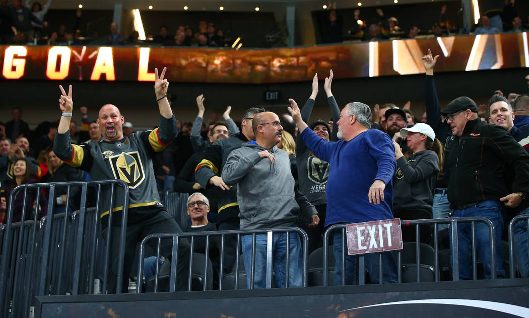 Golden Knights fans celebrate as the team makes an empty net goal against the Chicago Blackhawks during an NHL game at T-Mobile Arena in Las Vegas on Tuesday, Feb. 13, 2018. Chase Stevens Las Vega ...