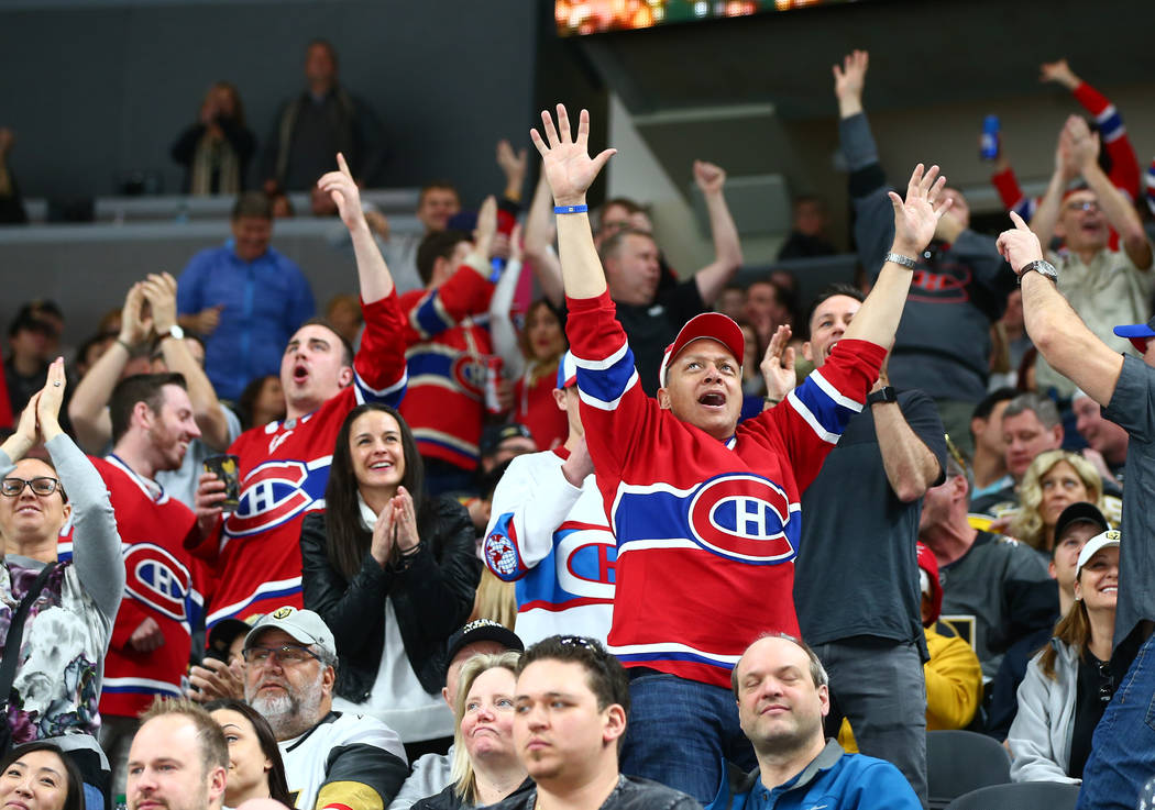 Female Canadiens fan flashes crowd during Game 4 victory celebration